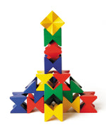 Naef Spiel wooden construction blocks stacked in a geometric tower on a white background