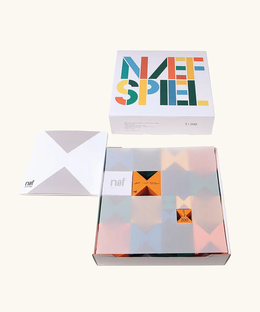 Naef spiel signature edition limited spiel block set. Tribute to Kurt Naef on the 100th anniversary of the founder's birth featuring a 60's inspired colour pallete with an information booklet. 