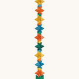 Naef spiel special 100 year edition spiel block set shown stacked into a tall tower. Tribute to Kurt Naef on the 100th anniversary of the founder's birth featuring a 60's inspired colour pallete. 