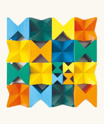 Naef spiel special 100 year edition spiel block set placed into a square shape. Tribute to Kurt Naef on the 100th anniversary of the founder's birth featuring a 60's inspired colour pallete. 