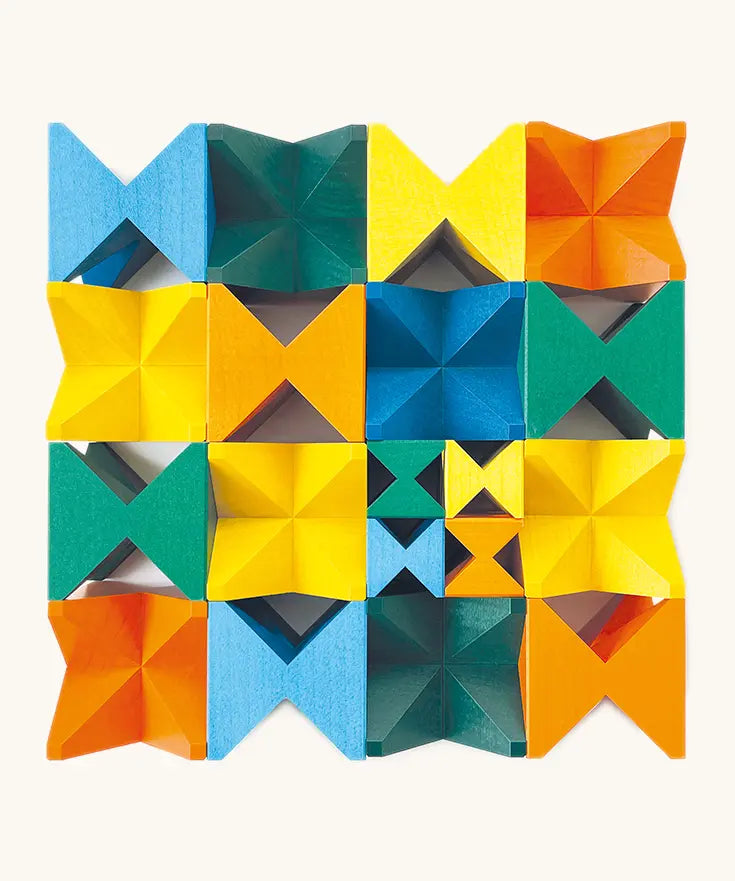 Naef spiel special 100 year edition spiel block set placed into a square shape. Tribute to Kurt Naef on the 100th anniversary of the founder's birth featuring a 60's inspired colour pallete. 