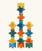 Naef spiel special 100 year edition spiel block set shown stacked into a tower. Tribute to Kurt Naef on the 100th anniversary of the founder's birth featuring a 60's inspired colour pallete. 