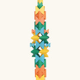 Naef spiel special 100 year edition spiel block set shown stacked into a tower. Tribute to Kurt Naef on the 100th anniversary of the founder's birth featuring a 60's inspired colour pallete. 