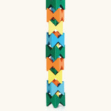 Naef spiel special 100 year edition spiel block set shown stacked into a tower. Tribute to Kurt Naef on the 100th anniversary of the founder's birth featuring a 60's inspired colour pallete. 