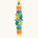 Naef Spiel signature stamped edition cubes stacked up to form a tall tower.