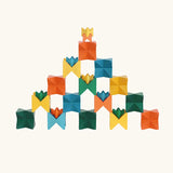 Naef Spiel signature stamped edition cubes stacked up to form a pyramid like shape.