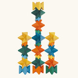 Naef Spiel signature stamped edition cubes stacked up to form three towers.