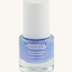 Blue Namaki nail polish from the fairy moonlight set on a cream background.