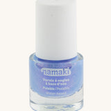 Blue Namaki nail polish from the fairy moonlight set on a cream background.