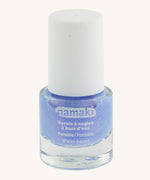 Blue Namaki nail polish from the fairy moonlight set on a cream background.