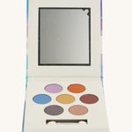 A open Namaki eye shadow palette on a cream background