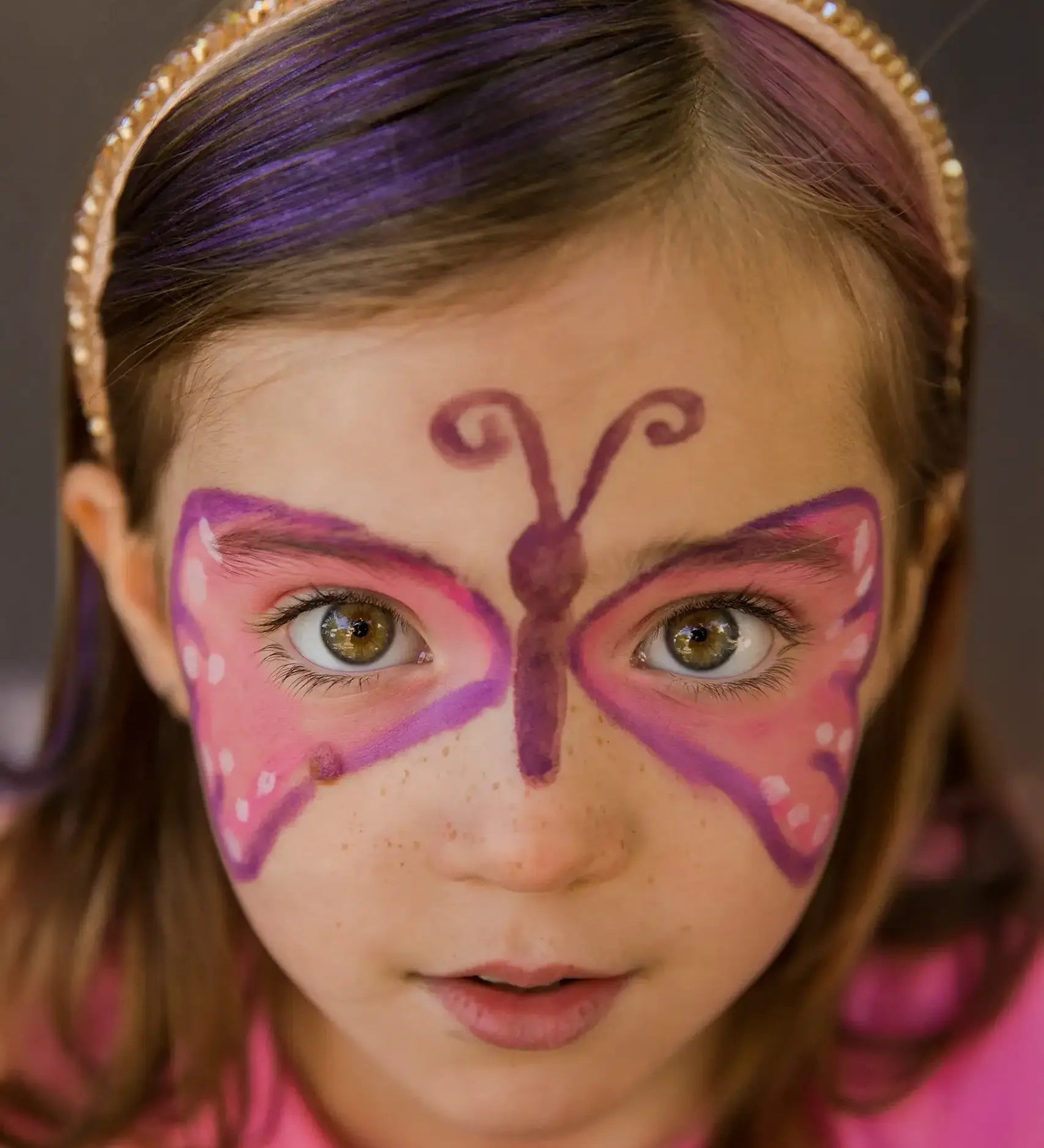 Namaki butterfly face painting kit used for a butterfly design on a child's face.