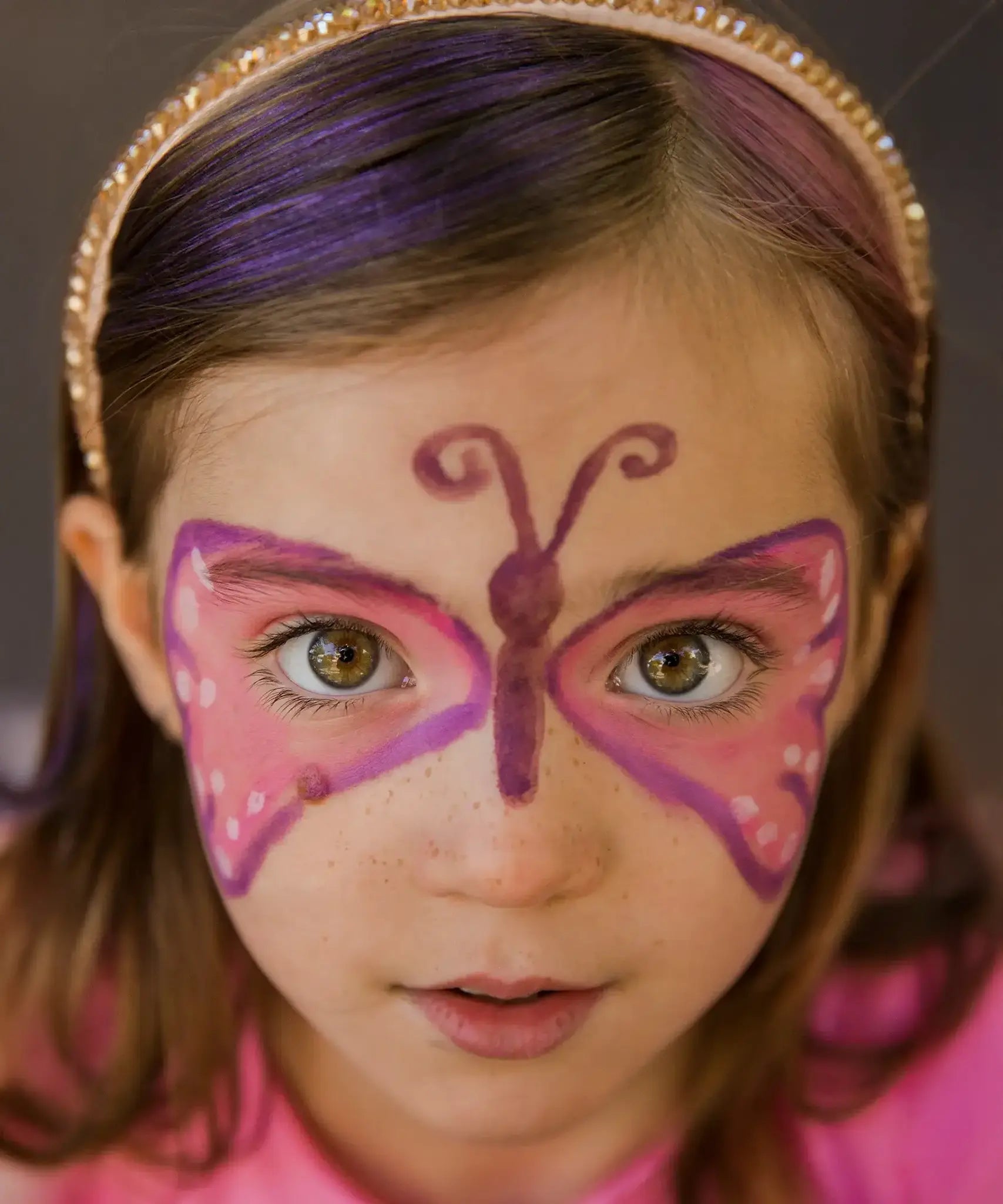 Namaki butterfly face painting kit used for a butterfly design on a child's face.