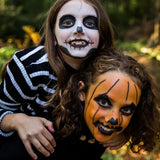 Namaki Halloween face painting kit used for a skeleton and pumpkin design on children's faces. 