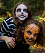 Namaki Halloween face painting kit used for a skeleton and pumpkin design on children's faces. 