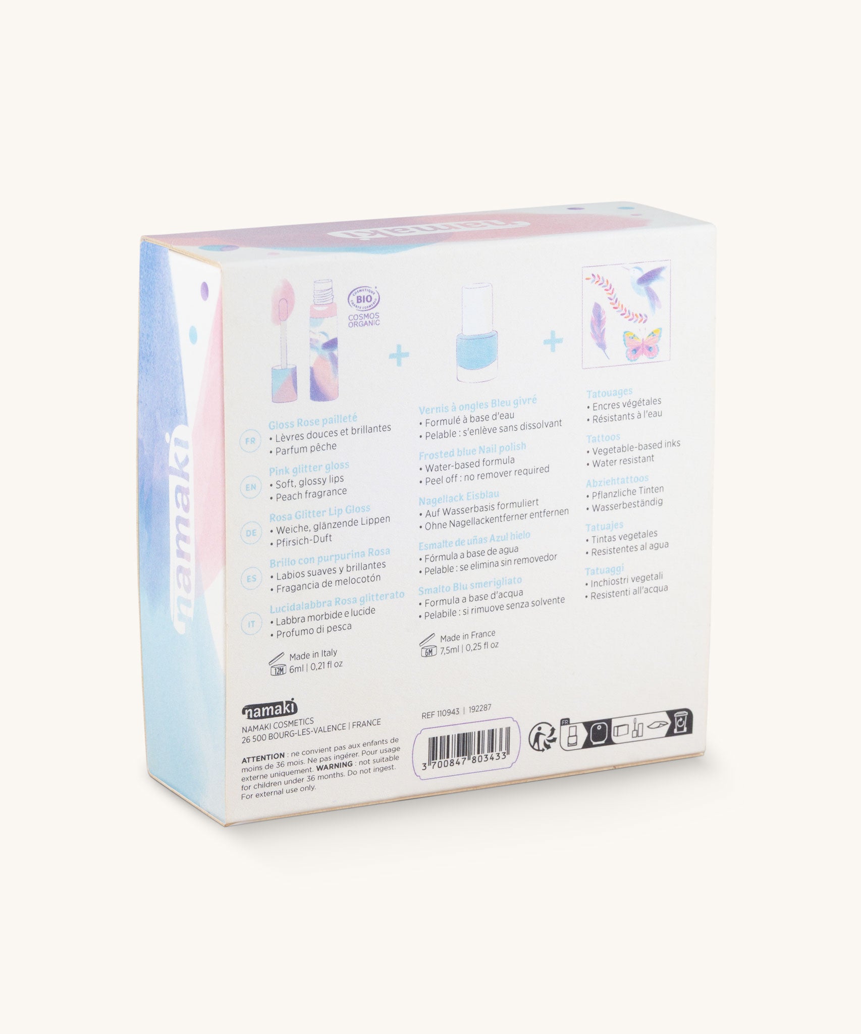 The back of the gift box showing the list of contents in the Namaki Hummingbird Trio Children's beauty Gift Set. The set contains a blue coloured nail polish, a sheet of tatoos and a lip gloss. Namaki have a range of natural and organic face paint sets and makeup for kids available at Babipur. 