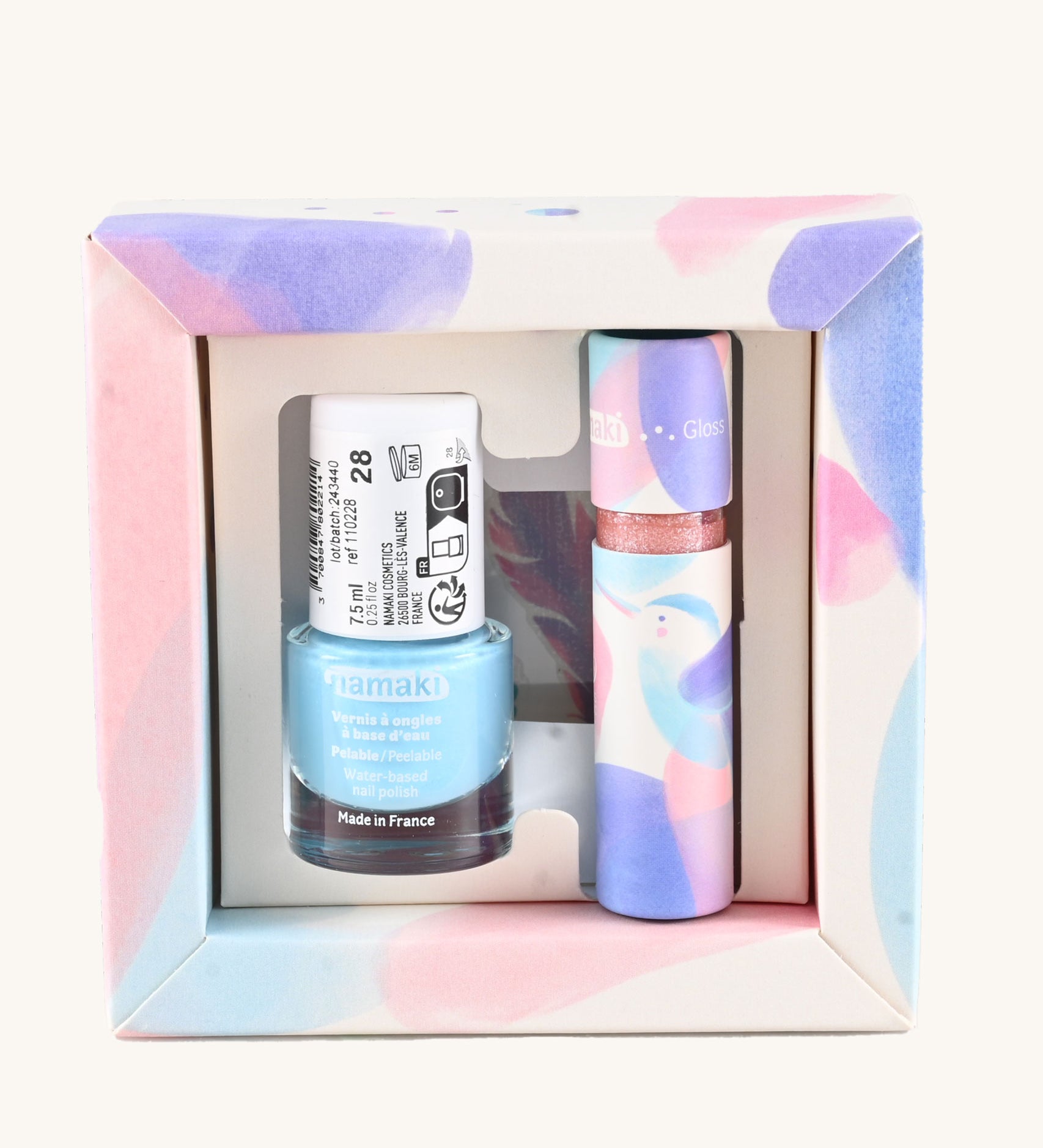 Namaki Hummingbird Trio Children's beauty Gift Set. The set contains a blue coloured nail polish, a sheet of tatoos and a lip gloss. Namaki have a range of natural and organic face paint sets and makeup for kids available at Babipur. 