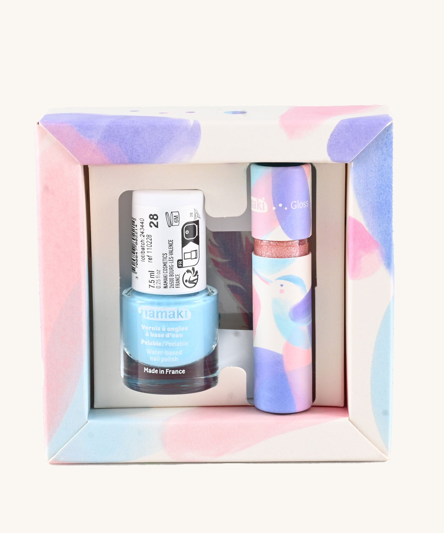 Namaki Hummingbird Trio Children's beauty Gift Set. The set contains a blue coloured nail polish, a sheet of tatoos and a lip gloss. Namaki have a range of natural and organic face paint sets and makeup for kids available at Babipur. 