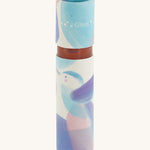 A close up of the Namaki lip gloss on a cream background