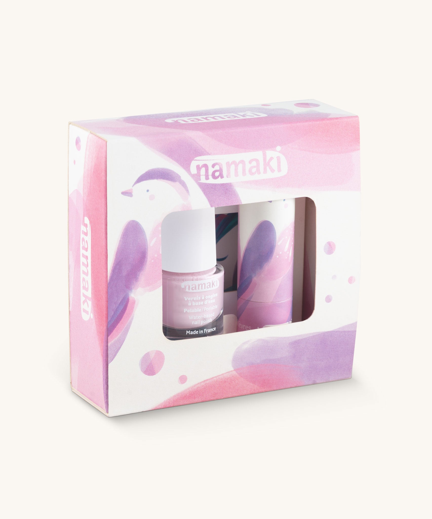 Namaki Nightingale Trio Children's beauty Gift Set. The set contains a pink coloured nail polish, a compact mirror and a raspberry lip balm. Namaki have a range of natural and organic face paint sets and makeup for kids available at Babipur. 