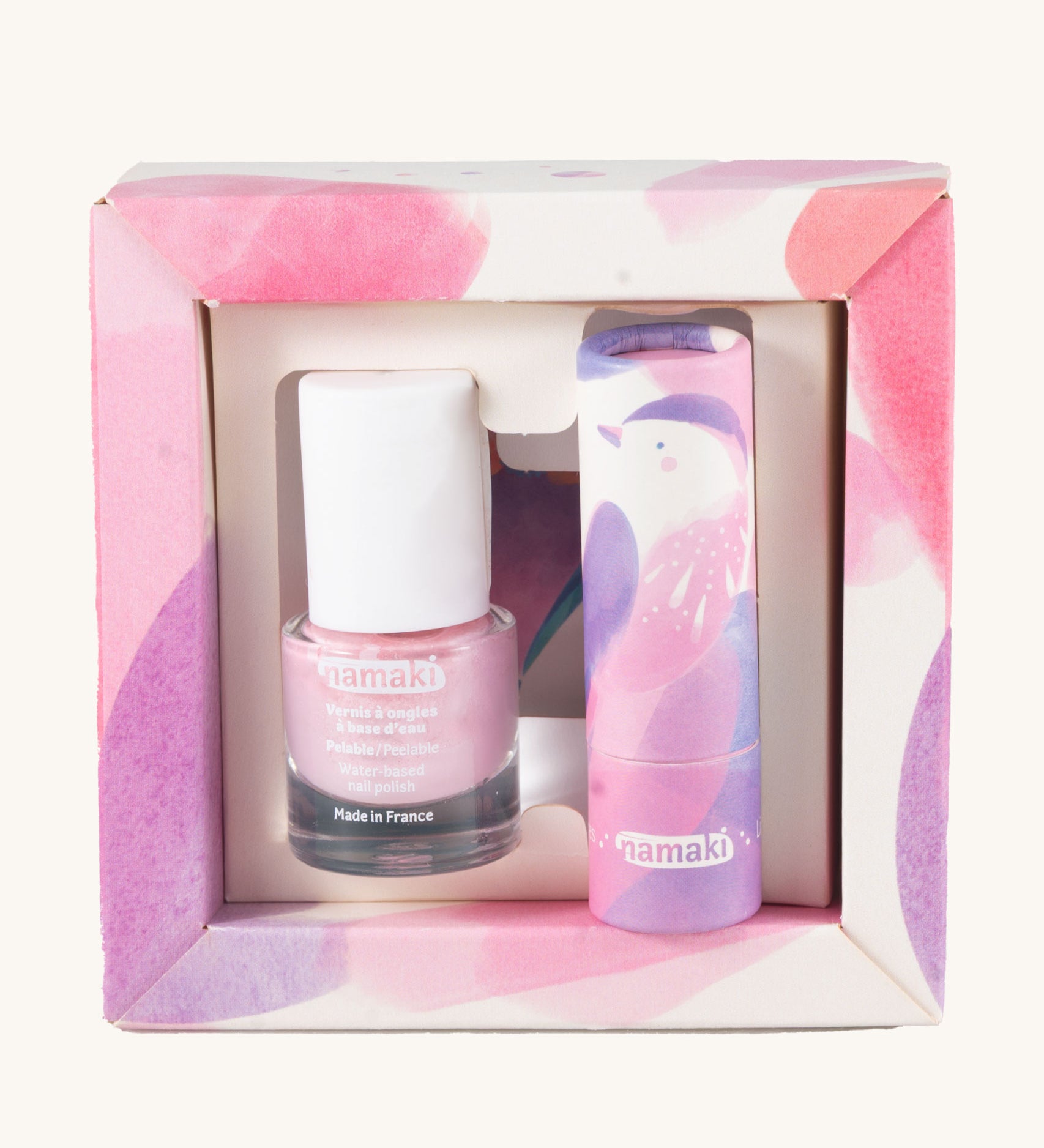 Namaki Nightingale Trio Children's beauty Gift Set. The set contains a pink coloured nail polish, a compact mirror and a raspberry lip balm. Namaki have a range of natural and organic face paint sets and makeup for kids available at Babipur. 