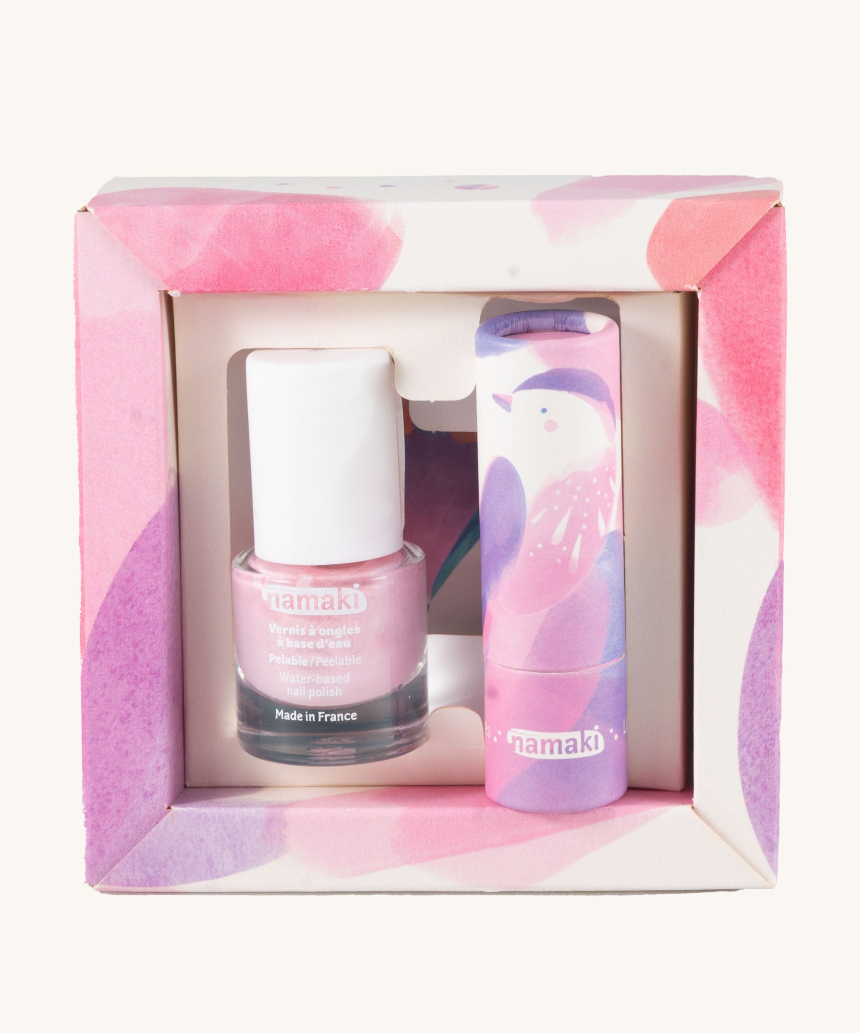 Namaki Nightingale Trio Children's beauty Gift Set. The set contains a pink coloured nail polish, a compact mirror and a raspberry lip balm. Namaki have a range of natural and organic face paint sets and makeup for kids available at Babipur. 