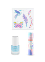 The contents of the Namaki Hummingbird makeup trio giftset at Babipur; a non-toxic blue nail polish, a sheet of temporary tattoos, a natural and organic lip gloss.