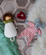 A Nanchen toadstool lullaby music toy next to a Nanchen elephant baby comforter soft toy.
