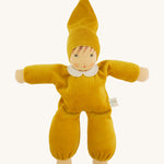A beautiful Nanchen Waldorf Nani Doll, with a pretty hand painted face. This hand crafted doll toy has a gold fabric, soft body with a small white collar and gold pointy hat. On a cream background