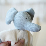 A close up of the Nanchen Elephant Teddy Rattle face, showing the texture of the material.