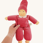 The Nanchen Nani Waldorf Doll with a Pink coloured outfit. 