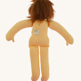 The back of the  Nanchen handcrafted Little Red Riding Hood Waldorf doll with no clothes on. 