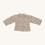 Nanchen Waldorf Doll - Lotte's floral blouse on a cream background 