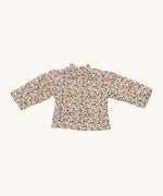 Nanchen Waldorf Doll - Lotte's floral blouse on a cream background 