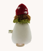 The back of the Nanchen Toadstool Lullaby Music Doll. A musical Waldorf doll, made from organic cotton and sheep's wool. 