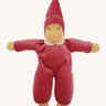 Nanchen Nani Waldorf Doll - Pink organic doll on a cream background.