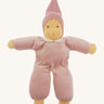 Nanchen Nani Waldorf Doll - Light pink organic doll on a cream background.