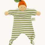 Front view of the Nanchen Orange Baby Comforter, a handcrafted doll with a natural-toned face and an orange velour fruit-inspired hat topped with a green leaf. The body is made of green and white striped organic cotton terry with knotted feet and extended arms, and includes a "Nanchen Natur" brand tag.