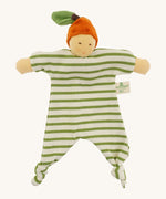 Front view of the Nanchen Orange Baby Comforter, a handcrafted doll with a natural-toned face and an orange velour fruit-inspired hat topped with a green leaf. The body is made of green and white striped organic cotton terry with knotted feet and extended arms, and includes a "Nanchen Natur" brand tag.