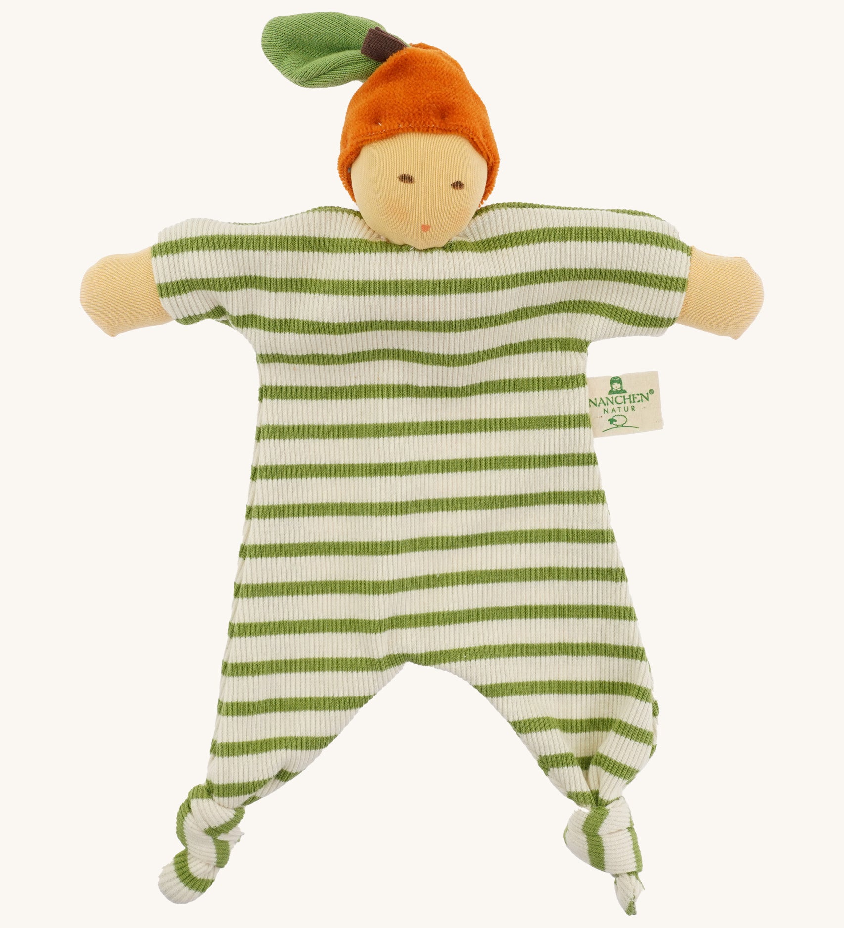 Front view of the Nanchen Orange Baby Comforter, a handcrafted doll with a natural-toned face and an orange velour fruit-inspired hat topped with a green leaf. The body is made of green and white striped organic cotton terry with knotted feet and extended arms, and includes a "Nanchen Natur" brand tag.