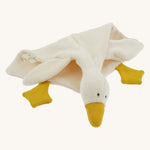 Side view of the Nanchen White Goose Comforter lying down. The doll’s soft terry fabric body drapes naturally, highlighting its cuddly, blanket-like shape and plush wool-stuffed head.