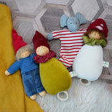 A collection of Nanchen organic soft toys. A Frederik Waldorf doll, Little red riding hood lullaby doll, elephant comforter and a toadstool lullaby doll. These heirloom quality toys are made in Germany from natural and organic materials, including Bioland-certified virgin sheep's wool and organic cotton.