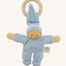 Front view of the Nanchen Pimpel Doll Baby Comforter in soft blue. The baby doll features softly painted facial details, a tall pointed hood, and a knotted footed design, with an attached wooden teething ring.