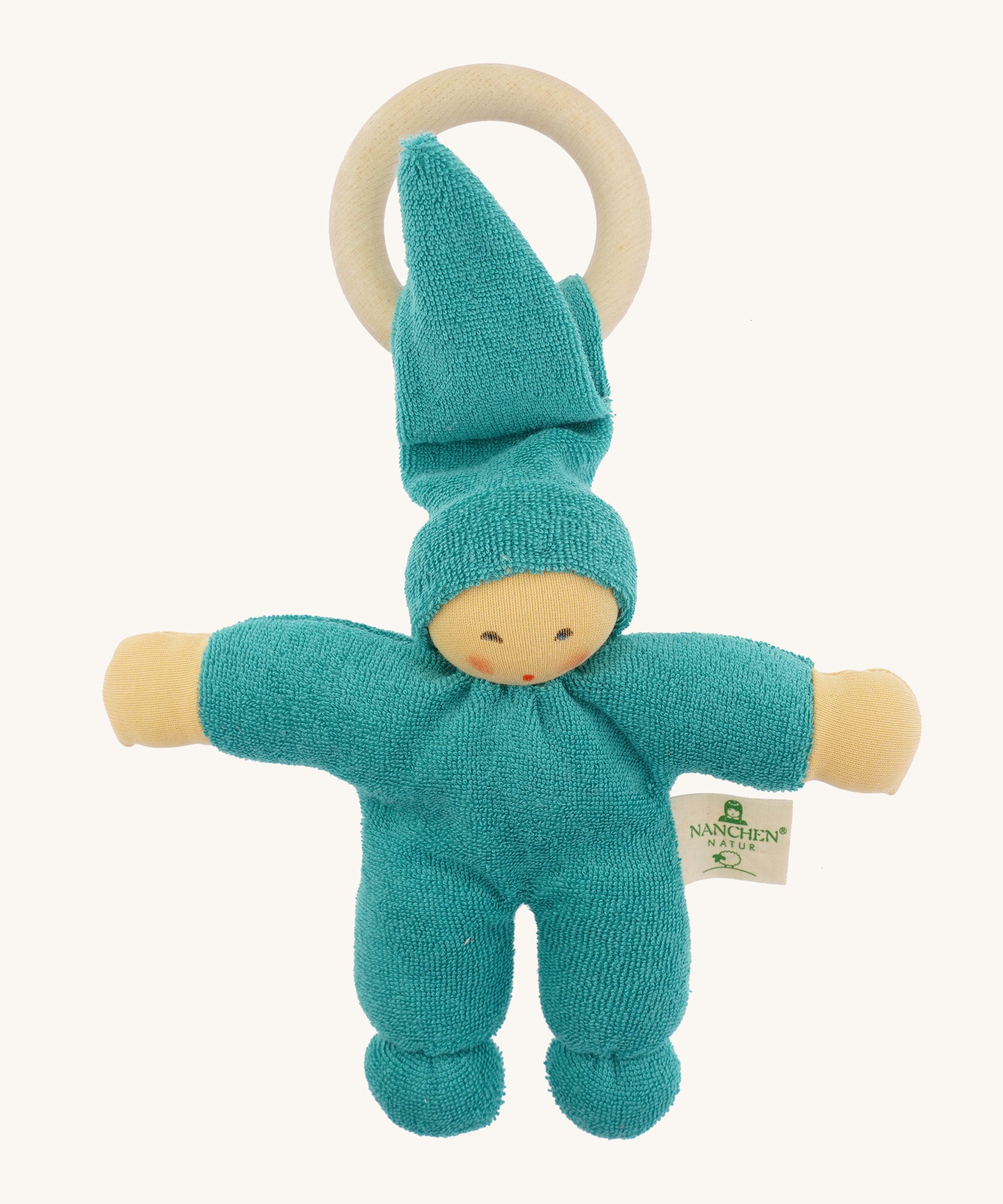 Front view of the Nanchen Pimpel Doll Baby Comforter in turquoise. The doll has a gentle, painted face, a tall pointed hat, soft organic cotton terry body, and a natural wooden ring for teething.