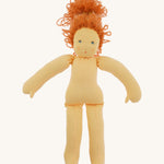 The Nanchen 'Flore' organic Waldorf doll, with her outfit taken off and curly red hair