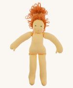 The Nanchen 'Flore' organic Waldorf doll, with her outfit taken off and curly red hair