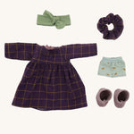 Marlene's removable outfit - a purple patterned dress, a matching scrunchie, a green hair bow, lilac boots, and blue underwear