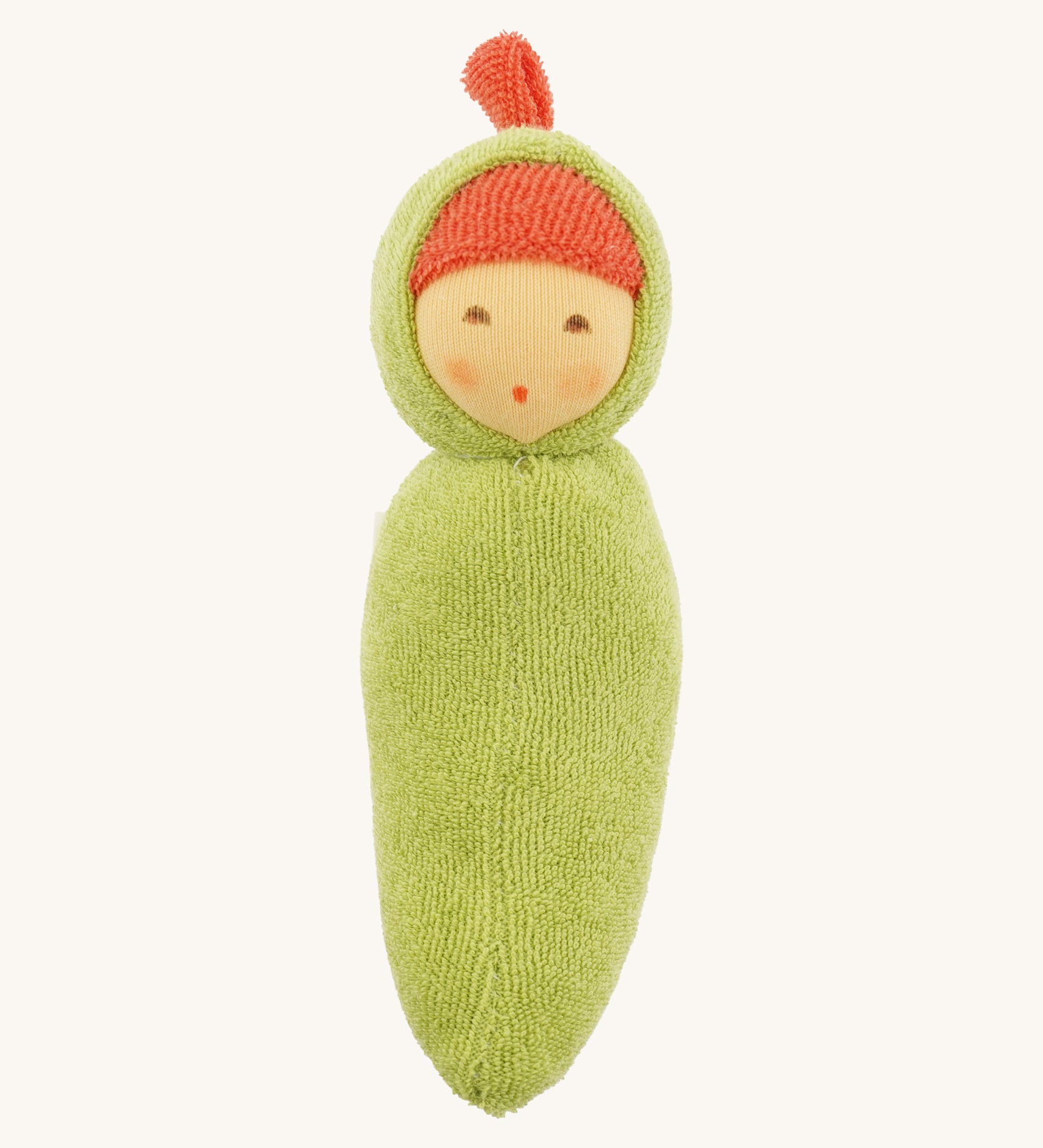 Front view of the Nanchen Pea Pod Rattle Doll, featuring a soft green organic cotton body shaped like a pea pod. The doll has a round hand-painted face with rosy cheeks and a red terry top knot, peeking from a hooded design.