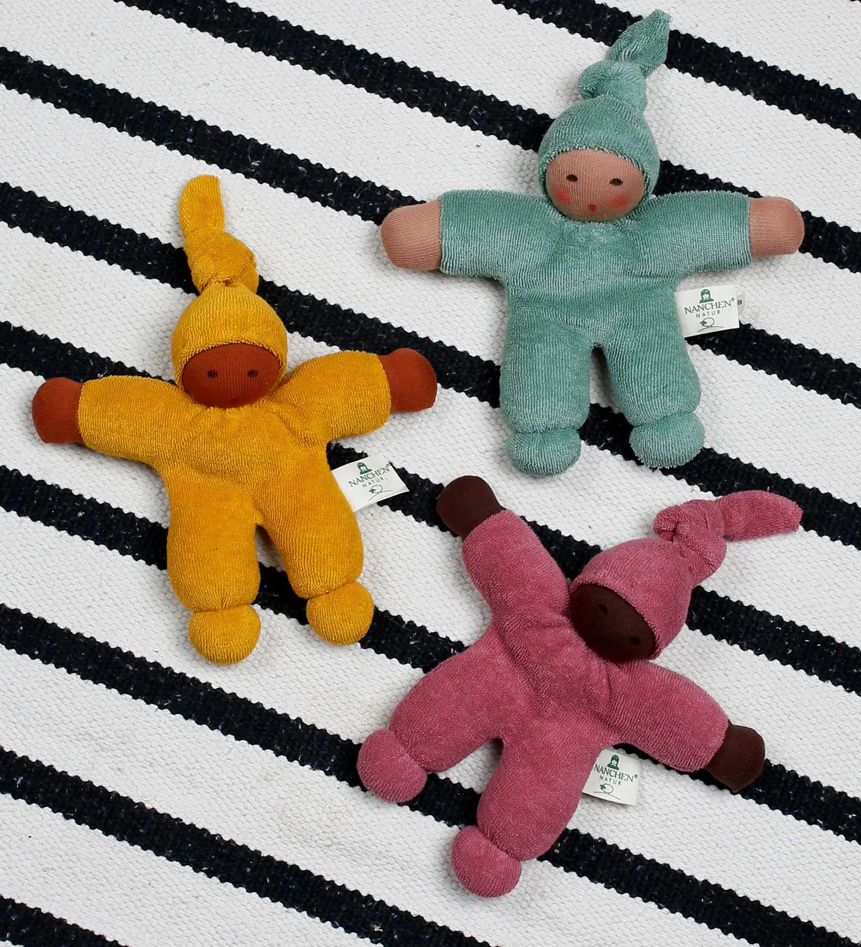 Nanchen berry, sage and yellow Waldorf style organic Pimpel dolls. Made from organic cotton and stuffed with natural sheep's wool. 