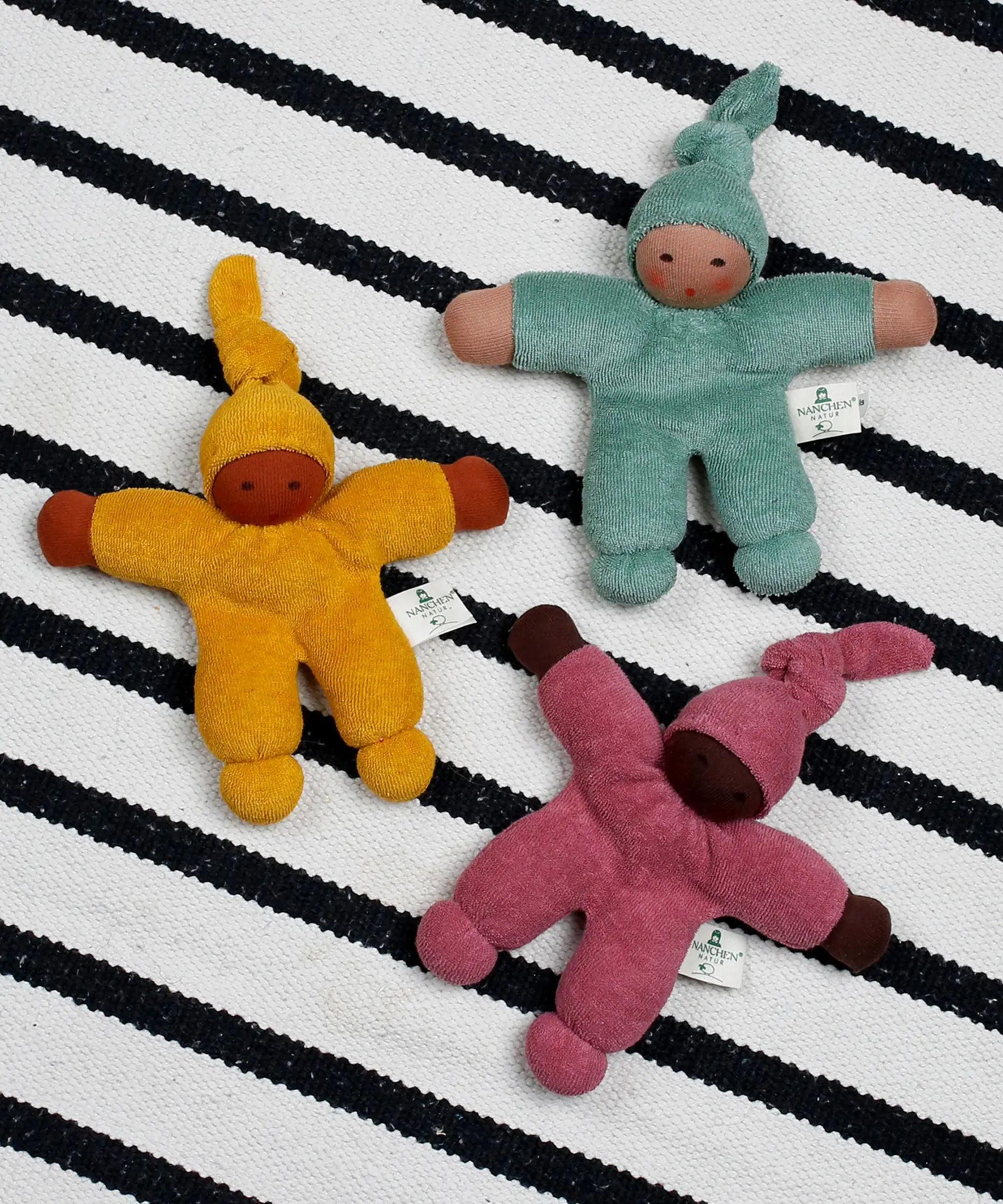 Nanchen berry, sage and yellow Waldorf style organic Pimpel dolls. Made from organic cotton and stuffed with natural sheep's wool. 
